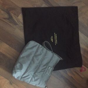 Grey mid size hand bag.